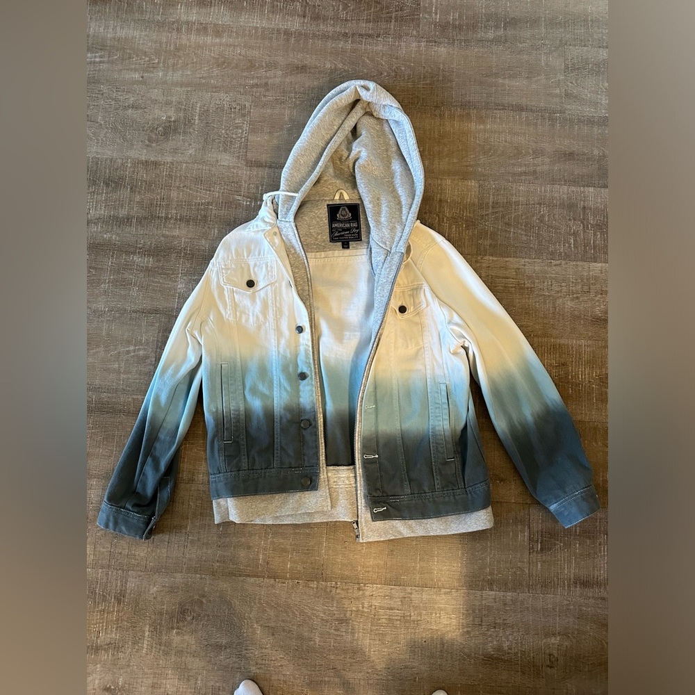 Men’s: White and blue Jean jacket with grey hood. New condition. Runs small, XXL